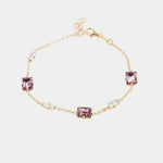 Bracciale in Argento 925 con giro di cristalli ametista e punti luce di cristalli bianchi.