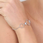 Bracciale in Argento 925 con cerchi puntellati alternati da cristalli colorazione acquamarina