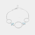 Bracciale in Argento 925 con cerchi puntellati alternati da cristalli colorazione acquamarina