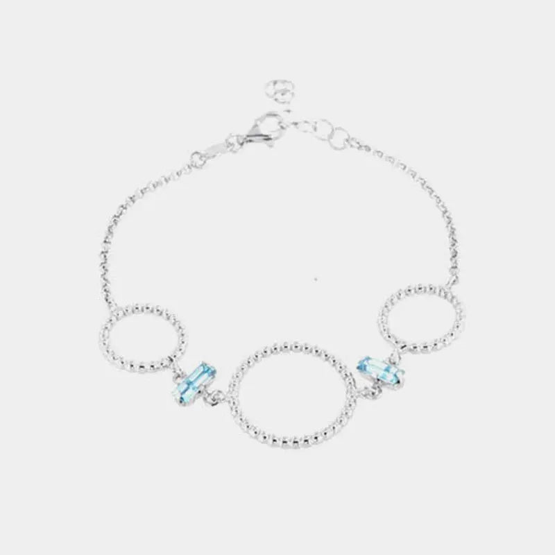 Bracciale in Argento 925 con cerchi puntellati alternati da cristalli colorazione acquamarina