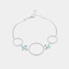 Bracciale in Argento 925 con cerchi puntellati alternati da cristalli colorazione acquamarina