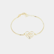 Bracciale in Argento 925 scritta KISS incorniciata in cuore con cristallo bianco.