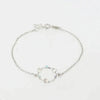 Bracciale in Argento 925 con cerchio impreziosito da cuori e cristalli colorati alternati.