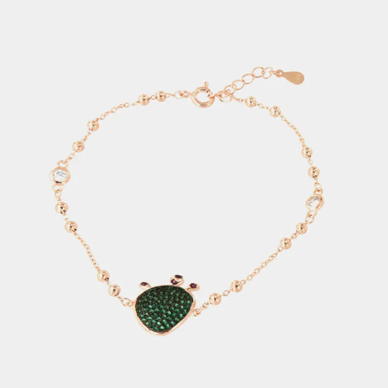 Bracciale in Argento 925 con ciondolo fico d'india, impreziosito da pavè di zirconi smeraldo, su base brunita