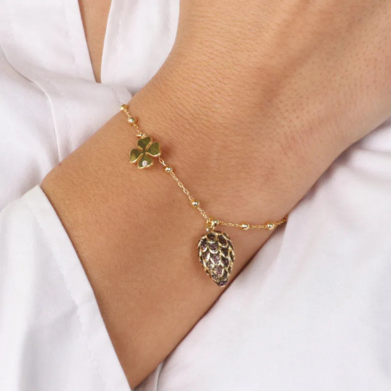 Bracciale in Argento 925 con ciondolo pigna e zirconi scuri, quadrifoglio con punto luce
