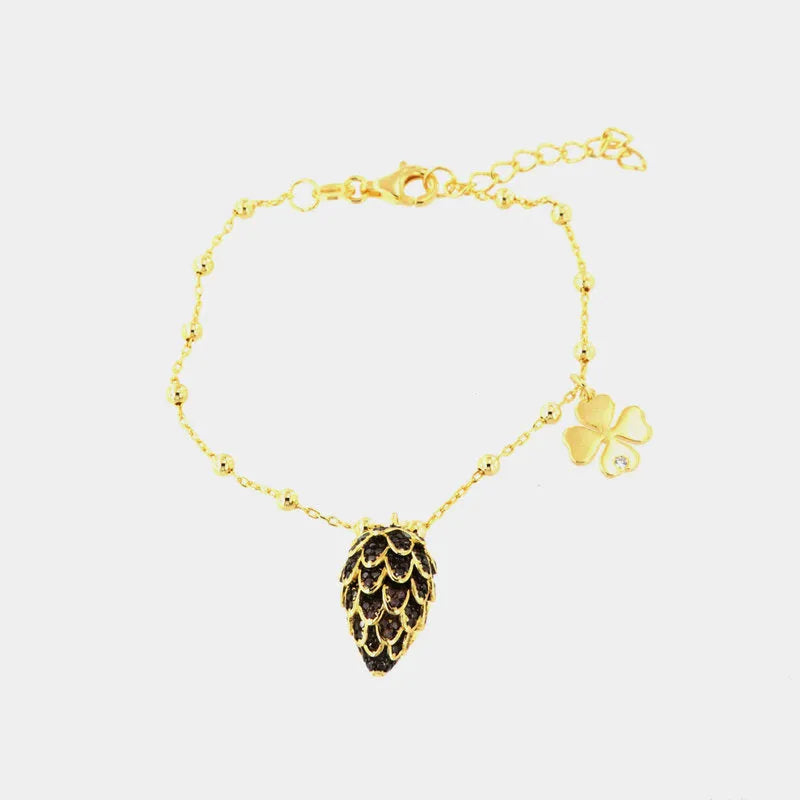 Bracciale in Argento 925 con ciondolo pigna e zirconi scuri, quadrifoglio con punto luce