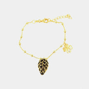 Bracciale in Argento 925 con ciondolo pigna e zirconi scuri, quadrifoglio con punto luce