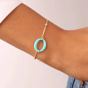 Bracciale in Argento 925 con dettaglio centrale smaltato turchese e zirconi bianchi