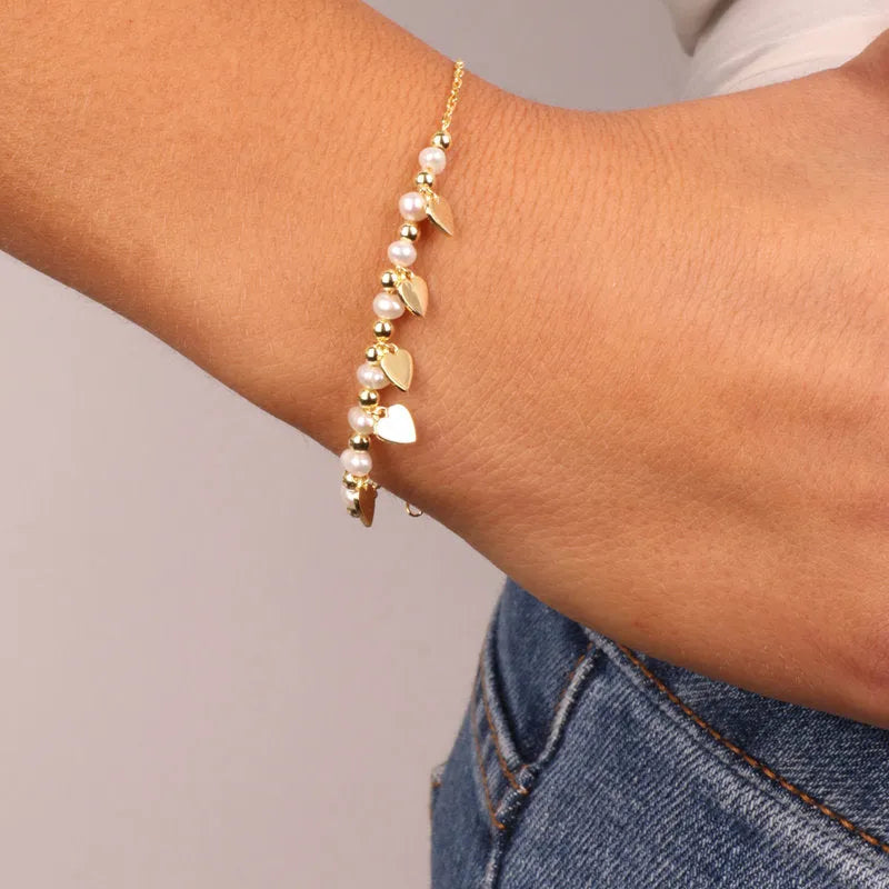 Bracciale in Argento 925 con perline alternate da cuori pendenti