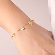 Bracciale in Argento 925  con ciondoli love, bacio e cuore tempestato da zirconi bianchi