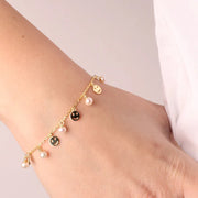 Bracciale in Argento 925 con perle e smile pendenti