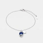 Bracciale in Argento 925 campanella portafortuna impreziosito da zirconi blu e quadrifoglio