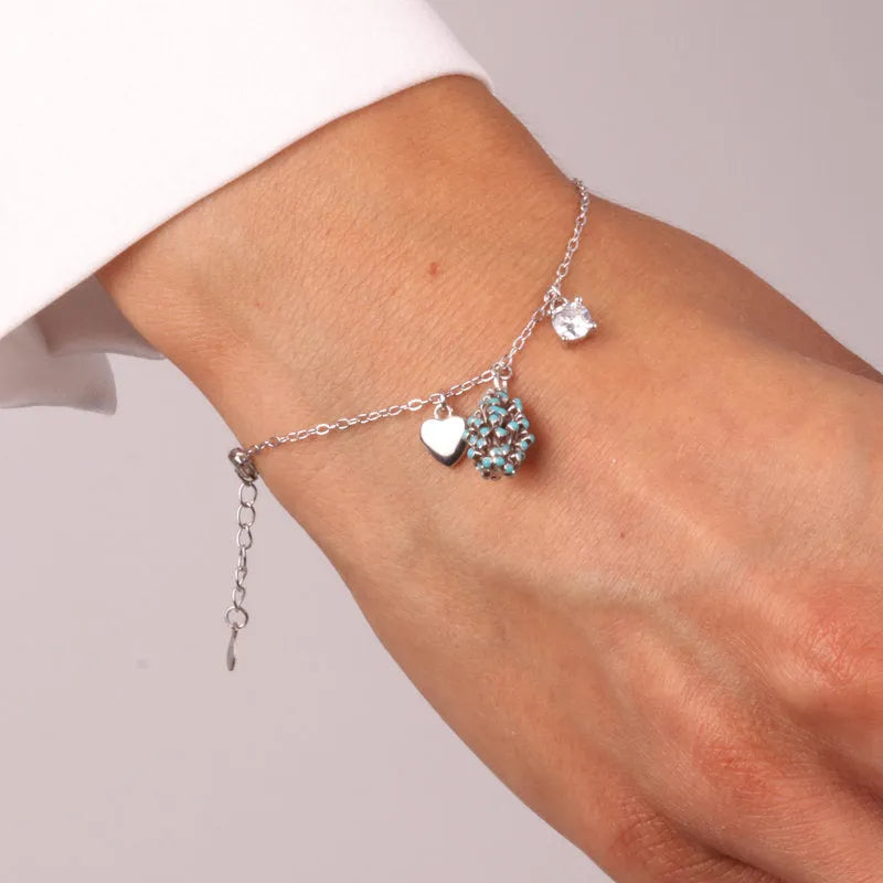 Bracciale in Argento 925 con pigna portafortuna impreziosito da zirconi blu e cuore pendente