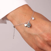 Bracciale in Argento 925 con pigna portafortuna impreziosito da zirconi blu e cuore pendente