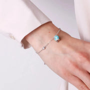 Bracciale in Argento 925 con campanella Capri azzurra e zirconi