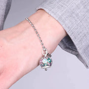 Bracciale in Argento 925 con campanella impreziosita da zirconi e smalti colorati
