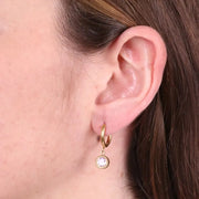 Orecchini in Acciaio cerchio con cristallo rosa