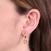 Orecchini in Acciaio cerchio con cuore rosa