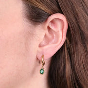 Orecchini in Acciaio cerchio con cristallo verde