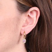 Orecchini in Acciaio cerchio con cristalli rosa