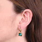 Orecchini in Acciaio cerchio con cristallo verde