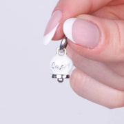 Ciondolo in Acciaio  campanella bianca con scritta Capri