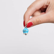 Ciondolo in Acciaio campanella azzurra con scritta Capri e zirconi