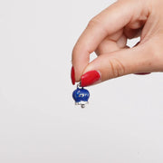 Ciondolo in Acciaio campanella blu con scritta Capri e zirconi