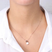 Collana in Acciaio con pendente a forma di luchetto impreziosito da un centrale effetto madreparla bianca