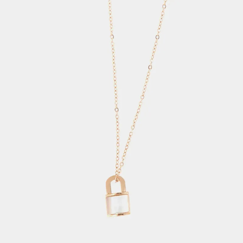 Collana in Acciaio con pendente a forma di luchetto impreziosito da un centrale effetto madreparla bianca