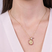 Collana in Acciaio con pendente ovale e perline rosa