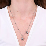 Collana in Acciaio con campanella pendente   con scritta Capri - BYSIMON gioielli