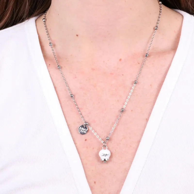 Collana in Acciaio con campanella  pendente bianca con scritta Capri - BYSIMON gioielli