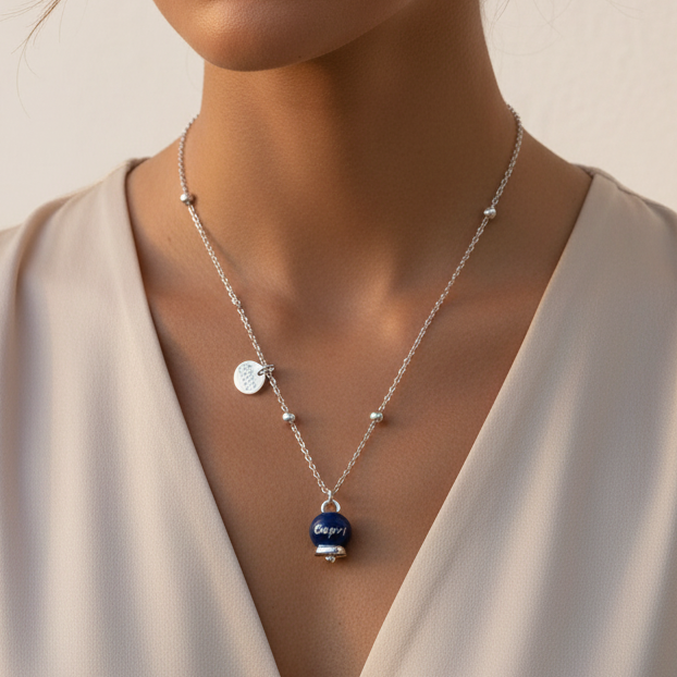 Collana in Acciaio con campanella pendente blu  con scritta Capri - BYSIMON gioielli