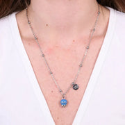 Collana in Acciaio con campanella pendente blu cobalto con scritta Capri