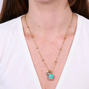 Collana in Acciaio con campanella pendente  verde con scritta Capri