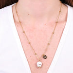 Collana in Acciaio con campanella  bianca e oro con scritta Capri - BYSIMON gioielli