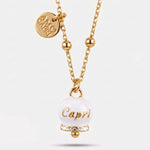 Collana in Acciaio con campanella bianca e oro con scritta Capri | gioielli in acciaio | BYSIMON