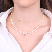 Collana in Acciaio con giro di perle e cuore rosa