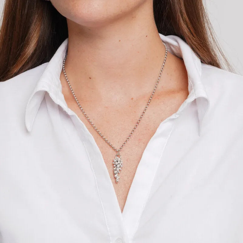 Collana in Acciaio con cornetto pendente e sfere bianche