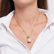 Collana in Acciaio campanella a pois bianchi e zirconi