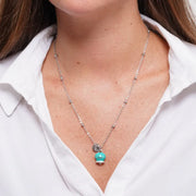 Collana in Acciaio campanella verde acqua con scritta Capri e zirconi