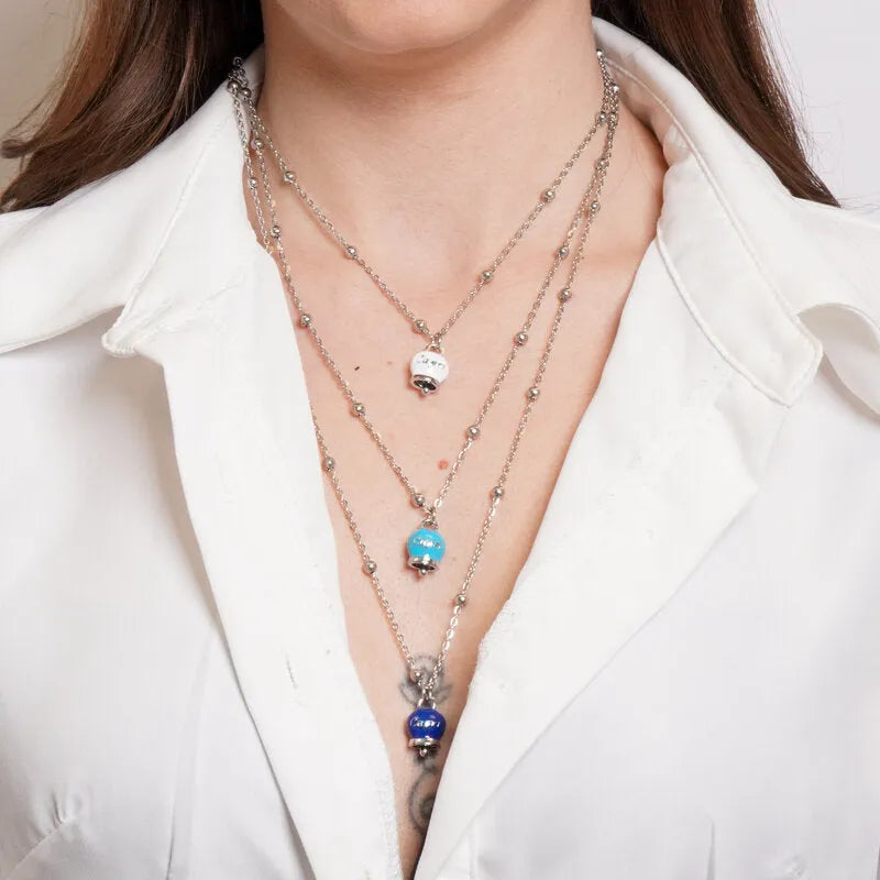 Collana in Acciaio Multifilo con Tris di Campanelle Portafortuna Capri tonalità blu, azzurra, bianca - gioiello BySimon