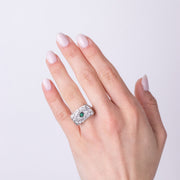 Anello in Acciaio con piastra impreziosito da occhio verde