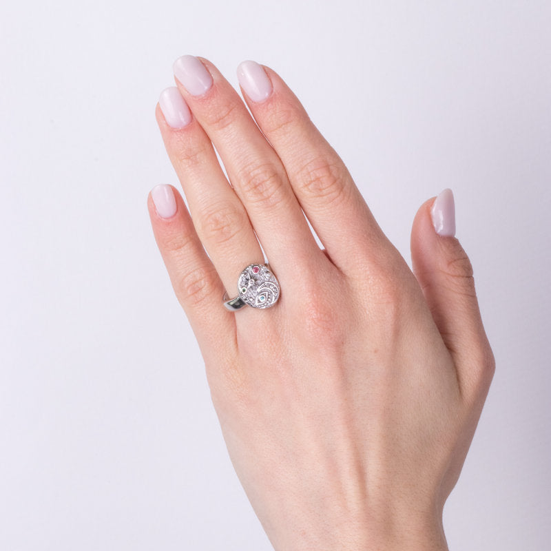 Steel ring with moon, eye and flower