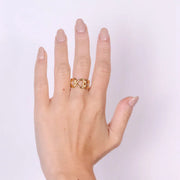 Anello in Acciaio a cuori intrecciato