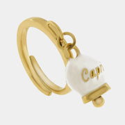 Anello in Acciaio con campanella  pendente  bianca e oro con scritta Capri