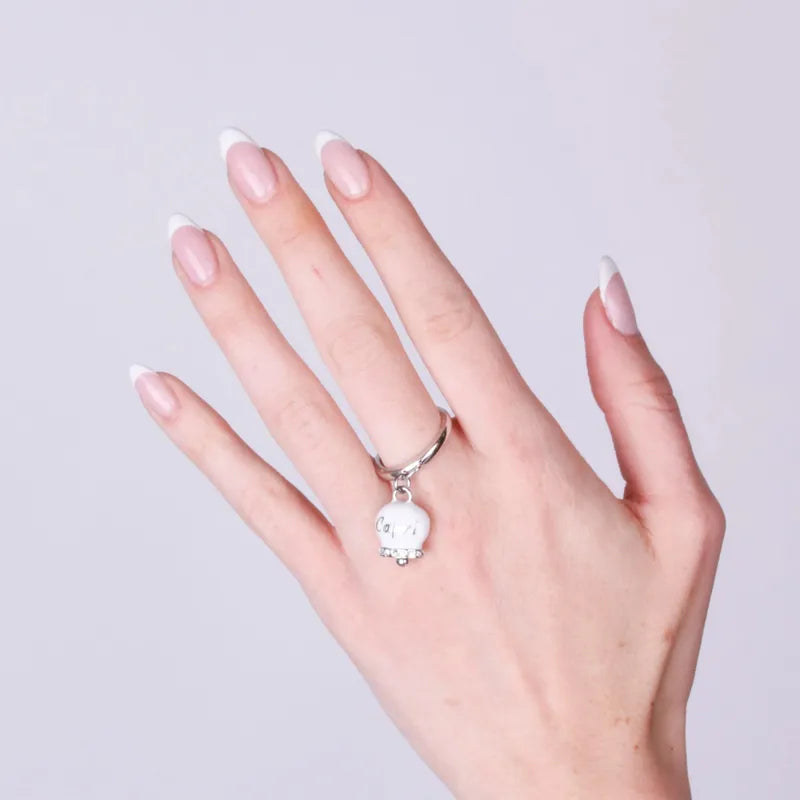 Anello in Acciaio con campanella bianca con scritta Capri - BYSIMON gioielli