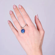 Anello in Acciaio con campanella blu con scritta Capri