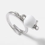 Anello in Acciaio con campanella portafortuna bianca e punto luce - BYSIMON gioielli